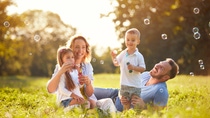 Happy family on a meadow Happy family on a meadow