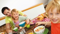 Photo of a family at breakfast