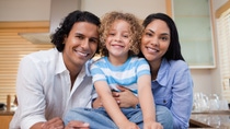 Cheerful young family together in the kitchen Cheerful young family together in the kitchen