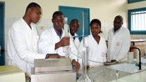 Laboratory staff on measuring instruments