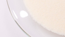 Photo of Vitamin E powder in a petri dish