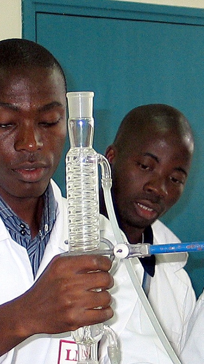 Laboratory staff on measuring instruments Laboratory staff on measuring instruments