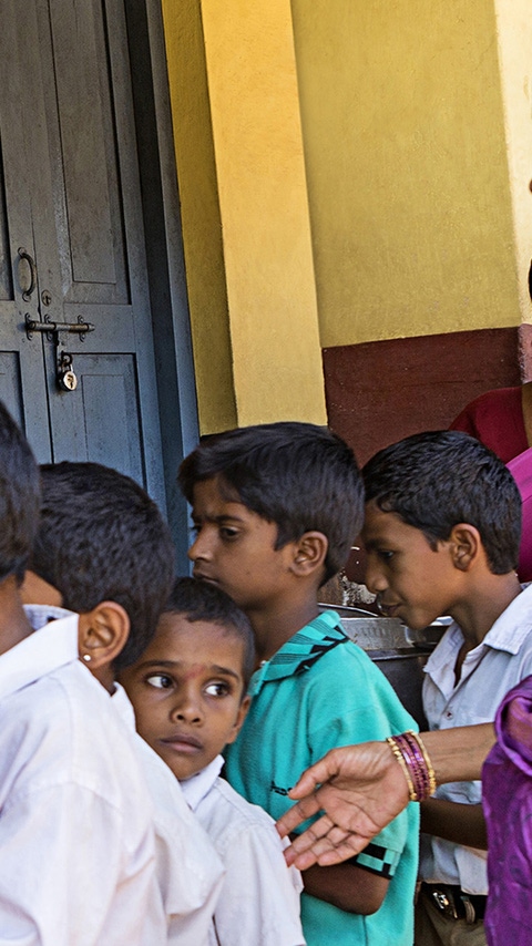 Serving meals at an Indian school